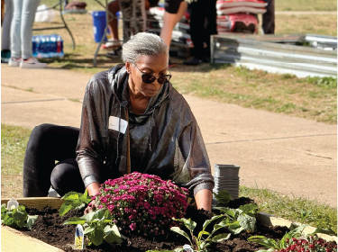 woman planting flowers